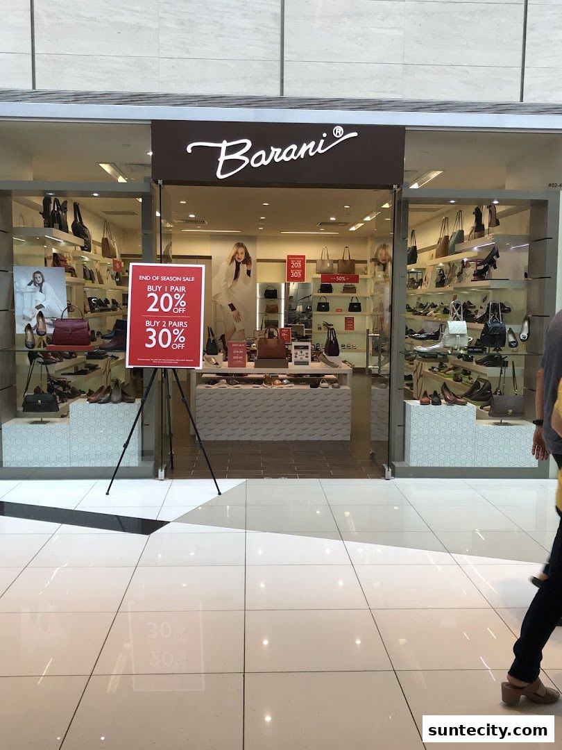 The Barani shoe store features a large display of shoes and handbags, with a sale sign.
