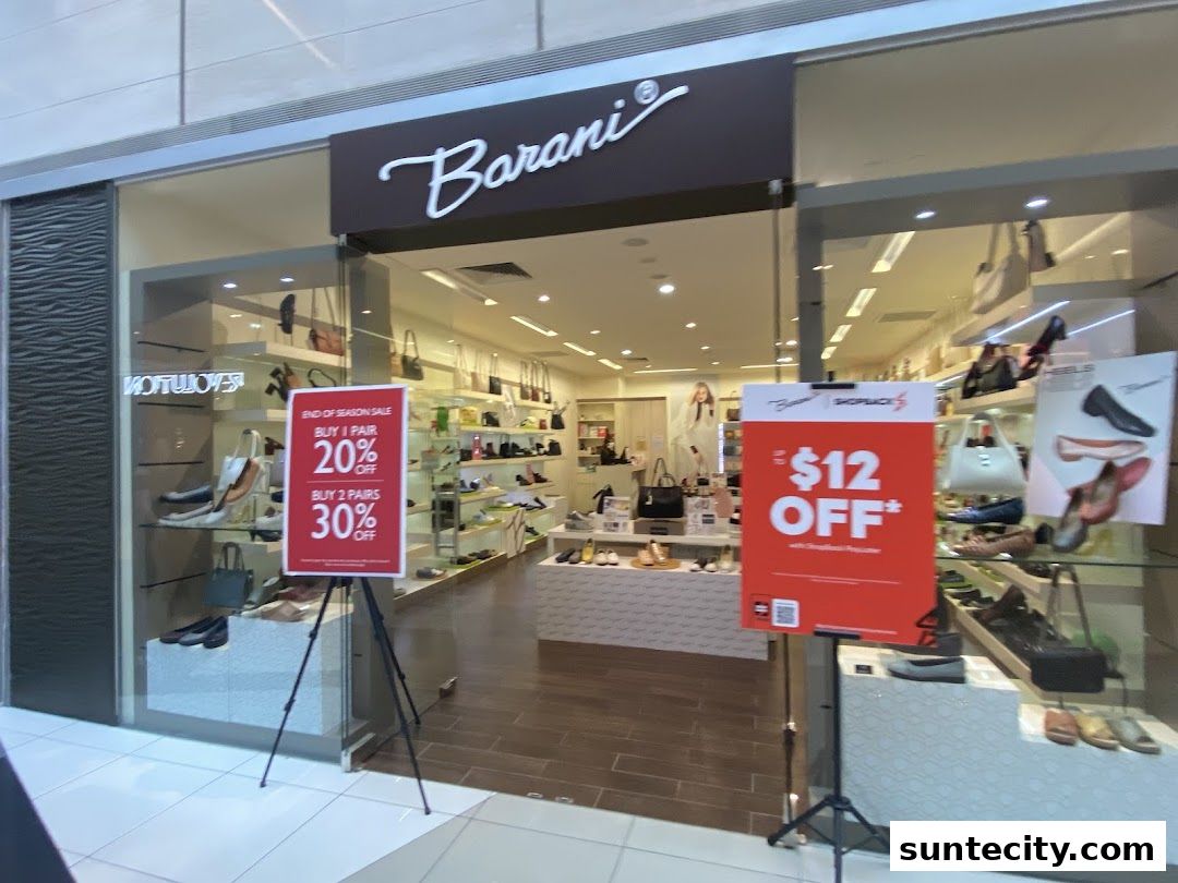 The entrance of a Barani shoe store with sale signs displayed.