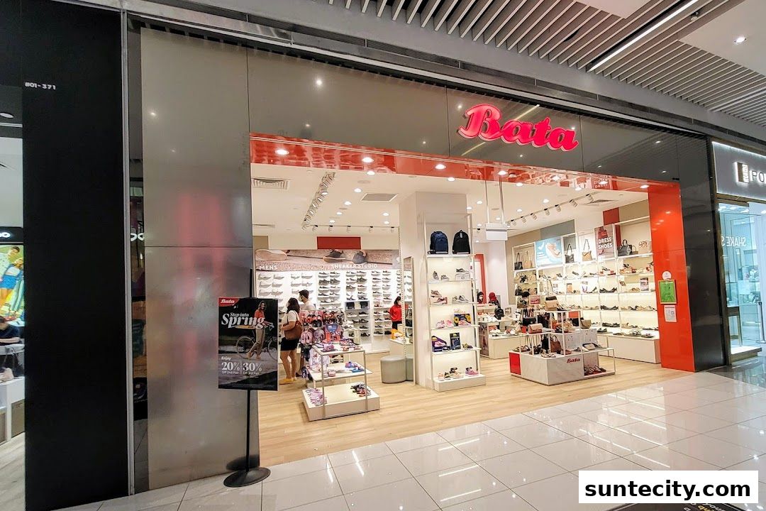The Bata shoe store entrance displays a wide selection of footwear for men, women, and children.