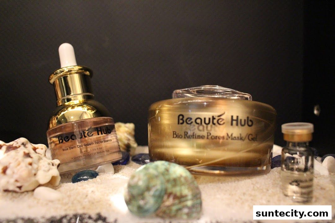 Beauté Hub skincare products displayed with seashells and sand.