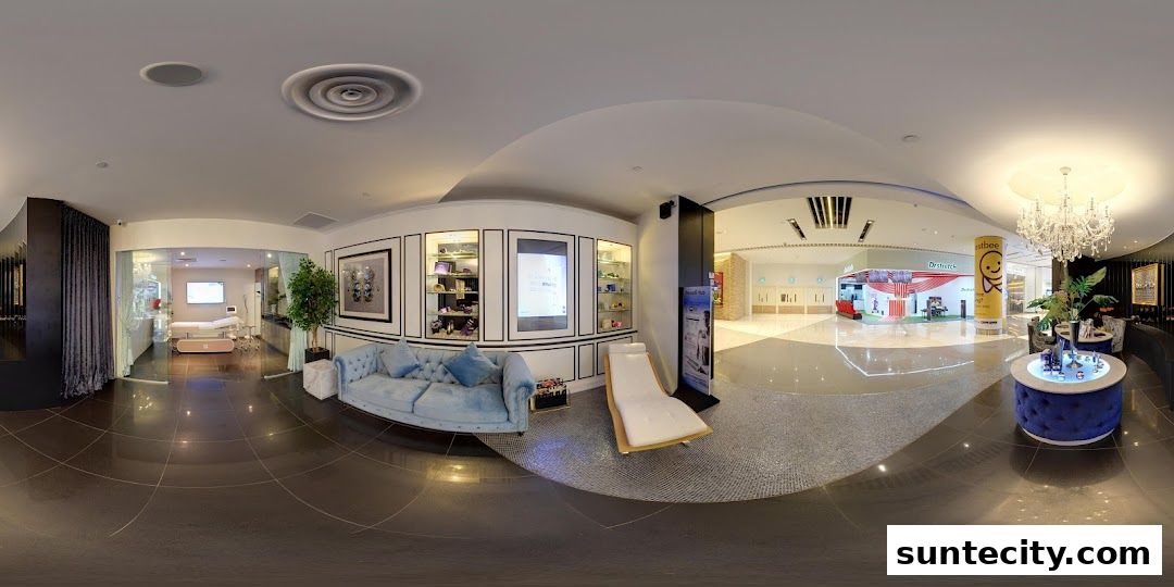 Interior view of a modern beauty clinic with a reception area and treatment rooms.