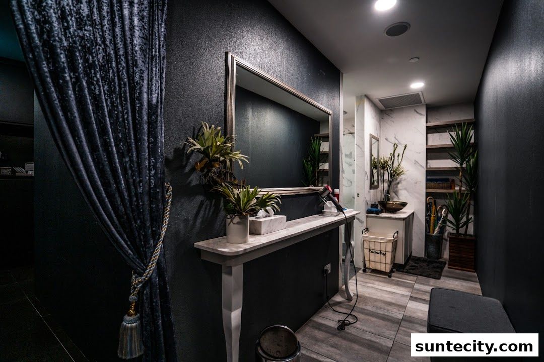 Interior of a modern spa or salon with elegant decor, plants, and a vanity area.