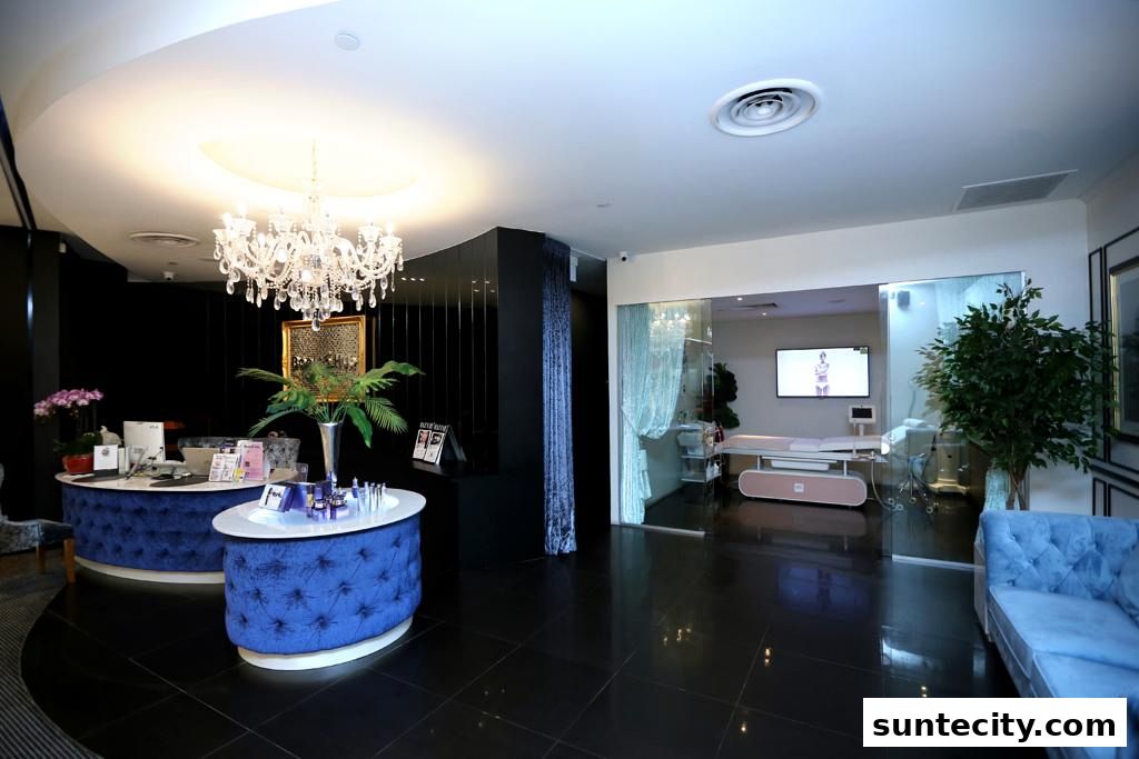 Luxurious beauty salon interior with plush seating, elegant reception desk, and treatment room.
