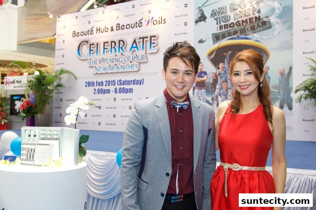 Two people smiling at the opening of new branches for Beauté Hub & Beauté Nails.