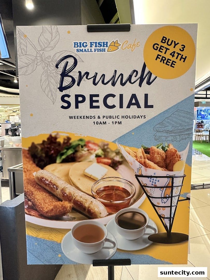 A promotional poster for Big Fish Small Fish Cafe's brunch special with a buy 3 get 4th free offer.