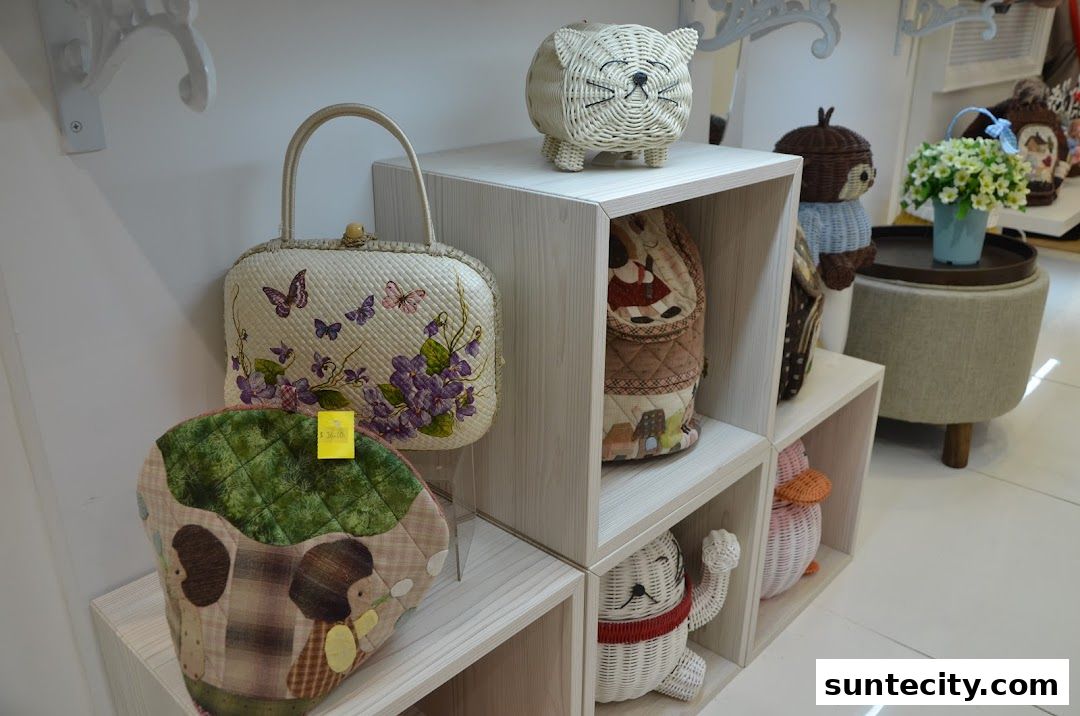 A display of charming woven bags and decorative items, including a cat-shaped basket and floral-themed accessories.