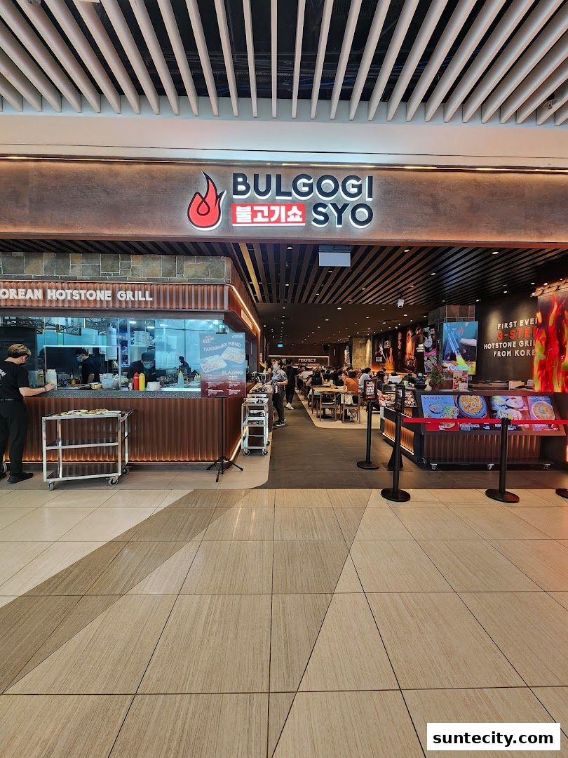 The exterior of Bulgogi Syo, a Korean hotstone grill restaurant, with customers inside.