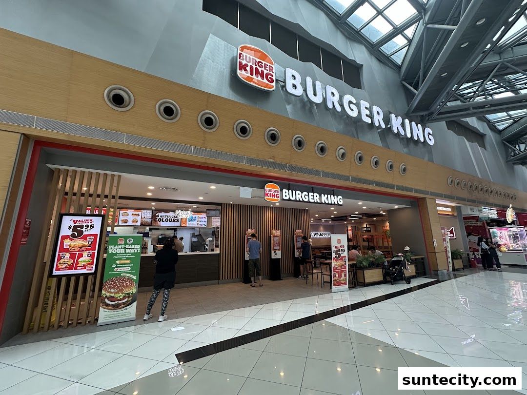 The exterior of a Burger King restaurant in a modern shopping mall.