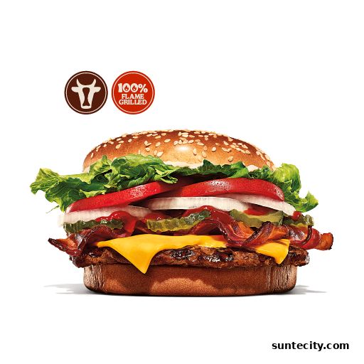 A close-up of a flame-grilled burger with cheese, bacon, lettuce, tomato, onion, and pickles.