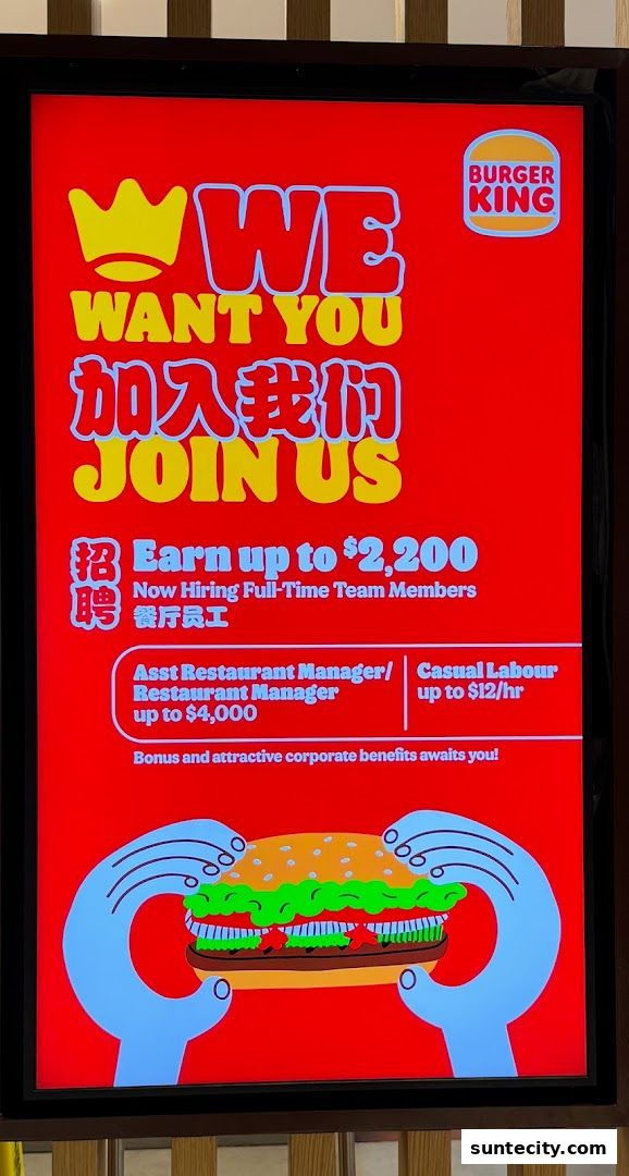 Burger King advertisement for job openings, featuring a burger and hiring information.