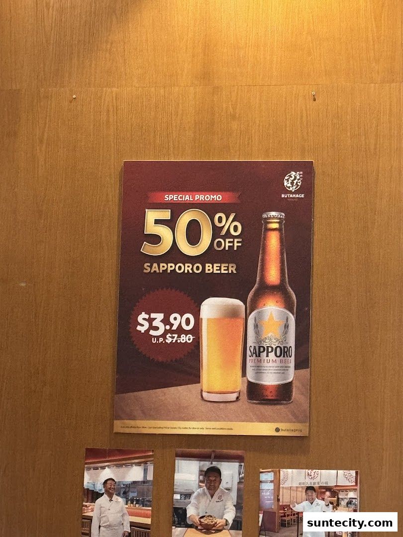 A promotional poster for 50% off Sapporo Beer at Butahage, with a special price of $3.90.