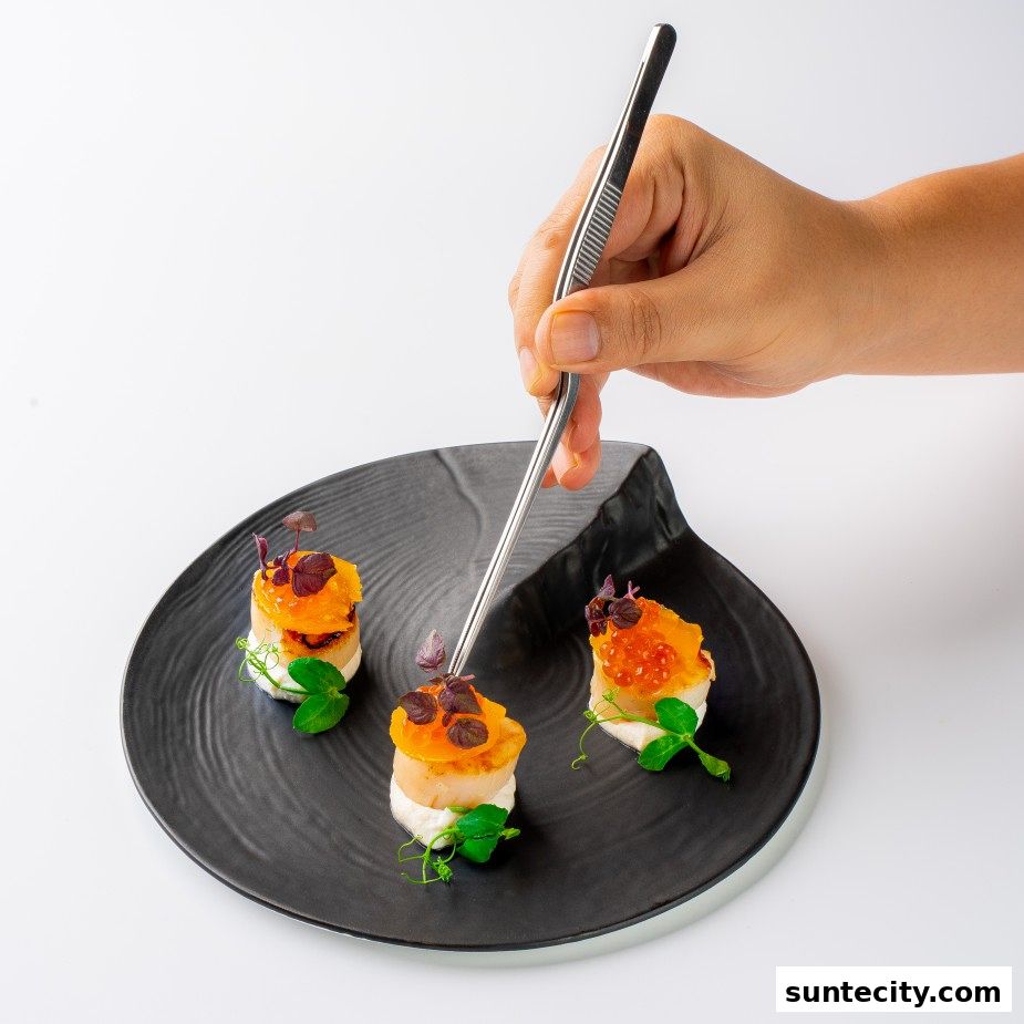 A hand uses tweezers to garnish a delicate scallop appetizer with microgreens.