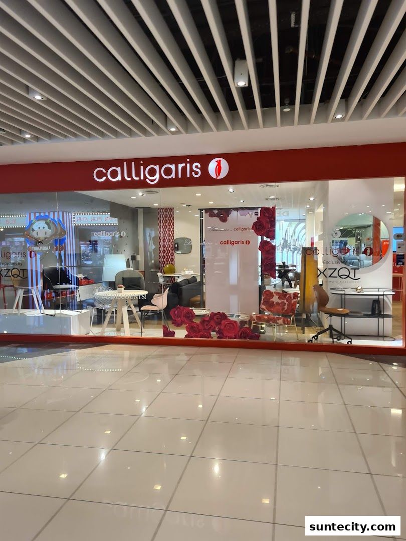 The storefront of Calligaris by XZQT, an Italian furniture store, showcasing stylish interior designs.