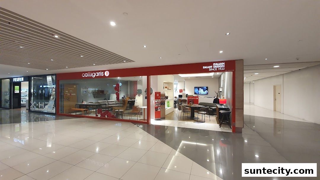 The Calligaris store showcases Italian furniture with modern living room and dining room setups.