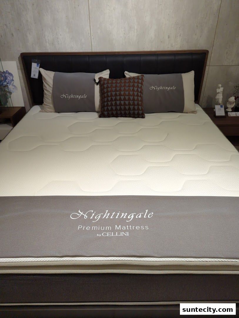 A premium Nightingale mattress by Cellini displayed with pillows and decorative items.