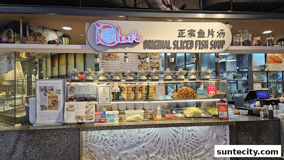 Chai's Original Sliced Fish Soup stall with a display of ingredients and menu.