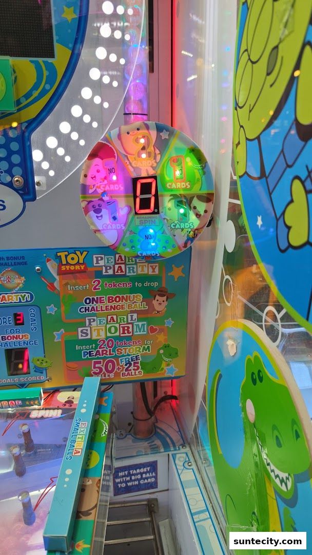 A close-up of a colorful arcade game with Toy Story characters and instructions for play.