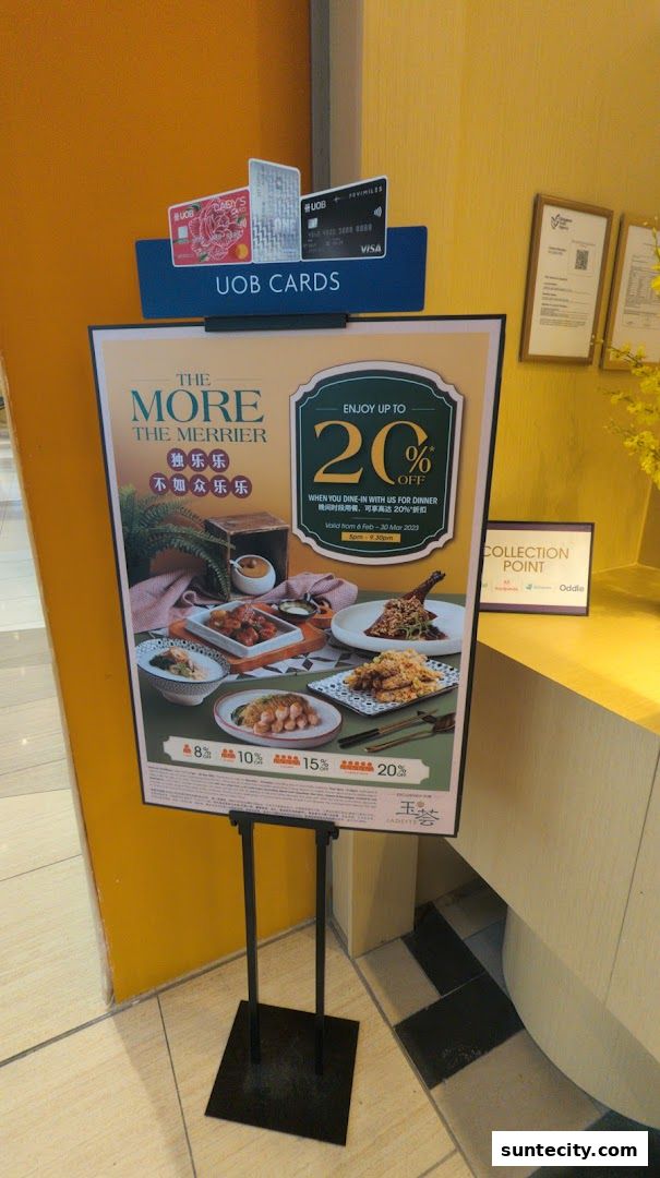 A promotional poster for Crystal Jade Hong Kong Kitchen offering discounts with UOB cards.
