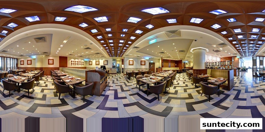Interior view of Crystal Jade Hong Kong Kitchen, showcasing dining tables and seating.