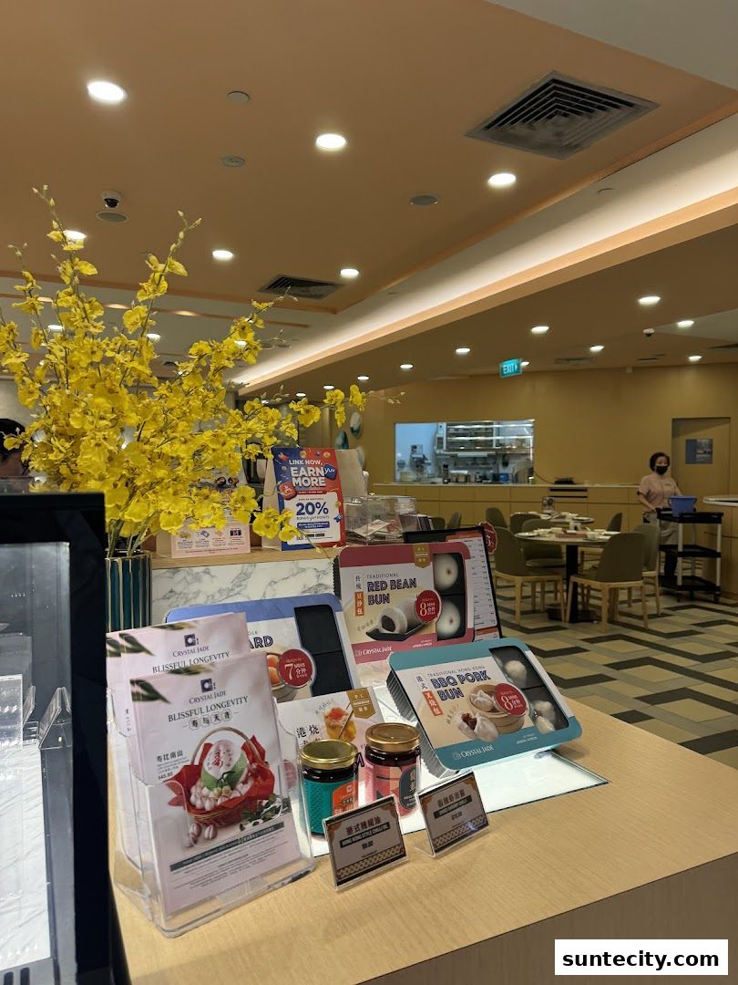 Display of food items and promotional materials at Crystal Jade Hong Kong Kitchen.