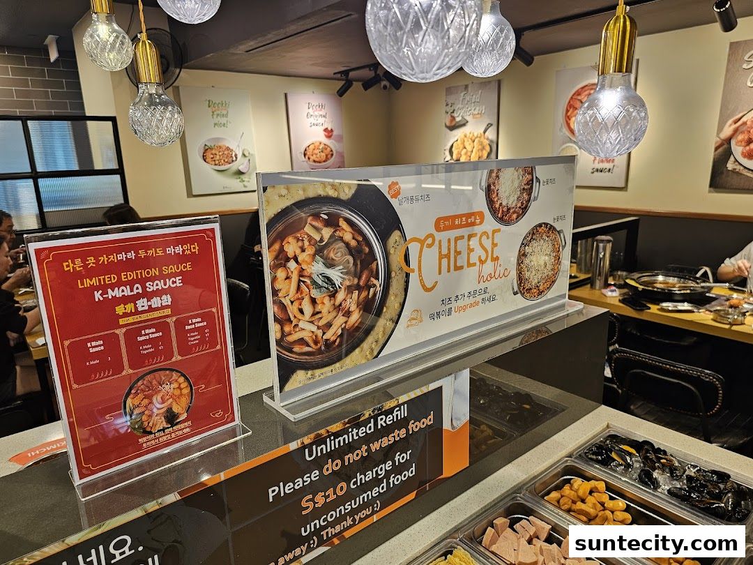 A display of Korean food items and sauces at a restaurant called Dookki.
