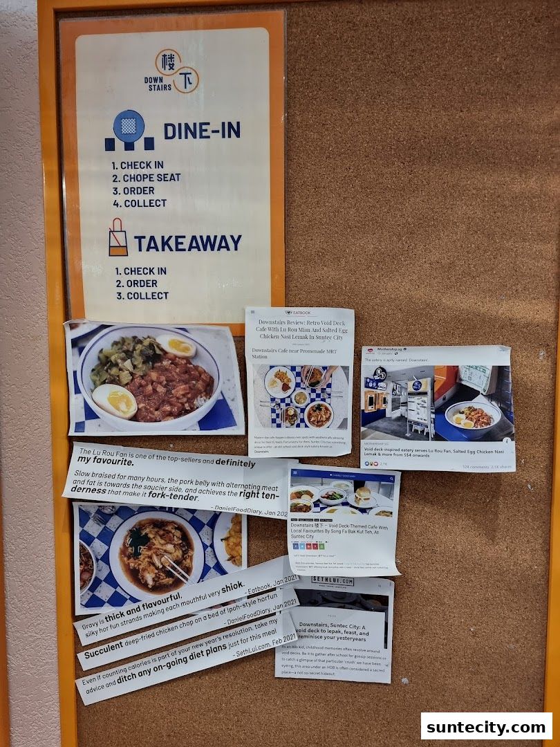 A corkboard displaying a menu for dine-in and takeaway, along with several positive reviews and food photos.