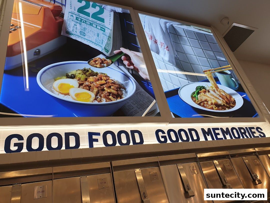 A display showcasing delicious food items with the slogan 'Good Food Good Memories'.