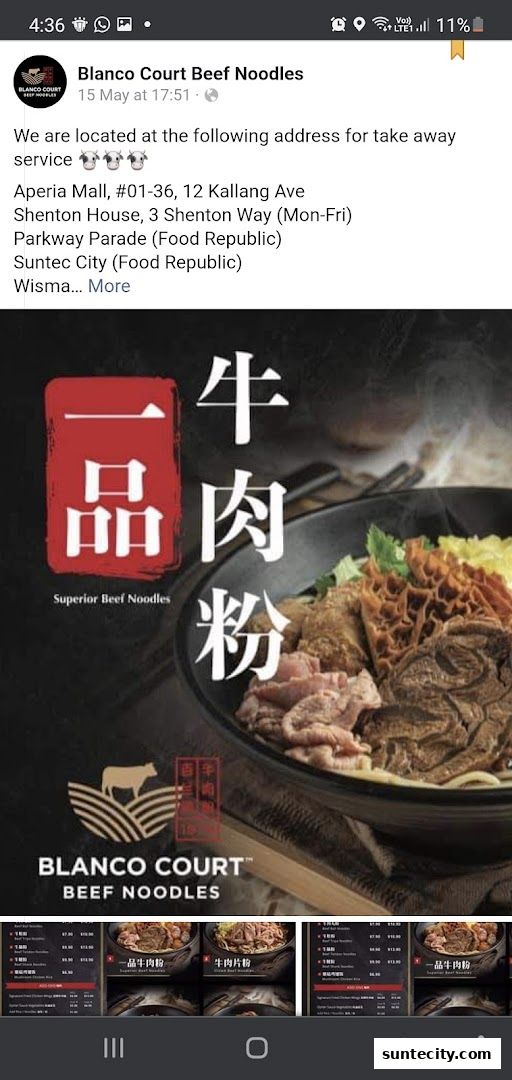 A close-up of a steaming bowl of beef noodles with various cuts of beef and tripe.