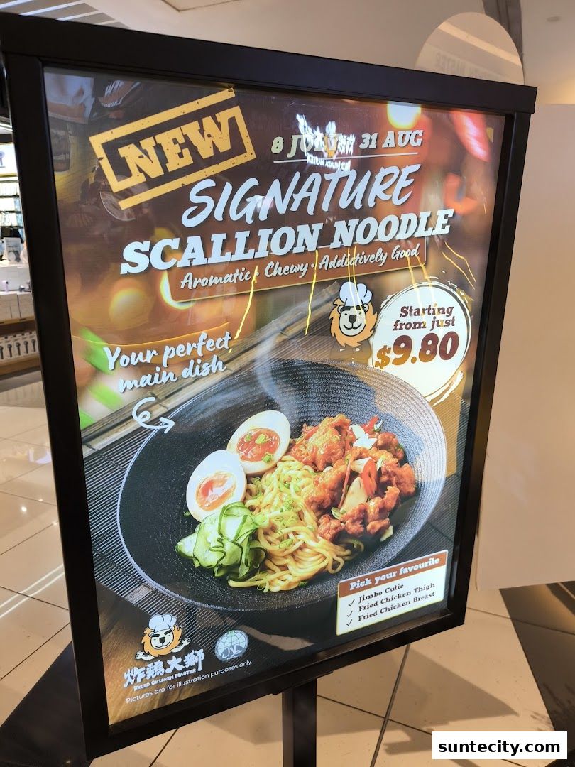 A promotional sign for Fried Chicken Master's new Signature Scallion Noodle dish.