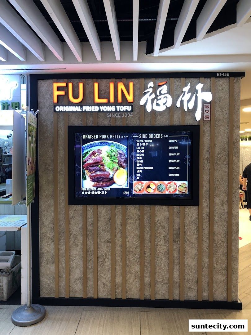 The exterior of FU LIN Yong Tau Foo, featuring a digital menu and the shop's name.