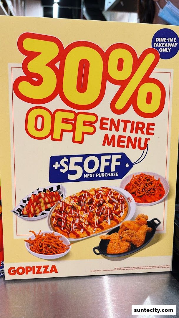 A promotional sign for GOPIZZA offering 30% off the entire menu and $5 off the next purchase.