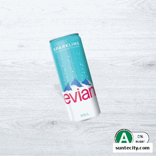 A can of Evian sparkling mineral water with mountains and bubbles on a wooden background.