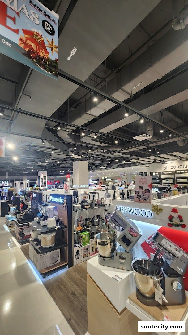 Interior view of Harvey Norman Suntec City showcasing kitchen appliances and electronics.