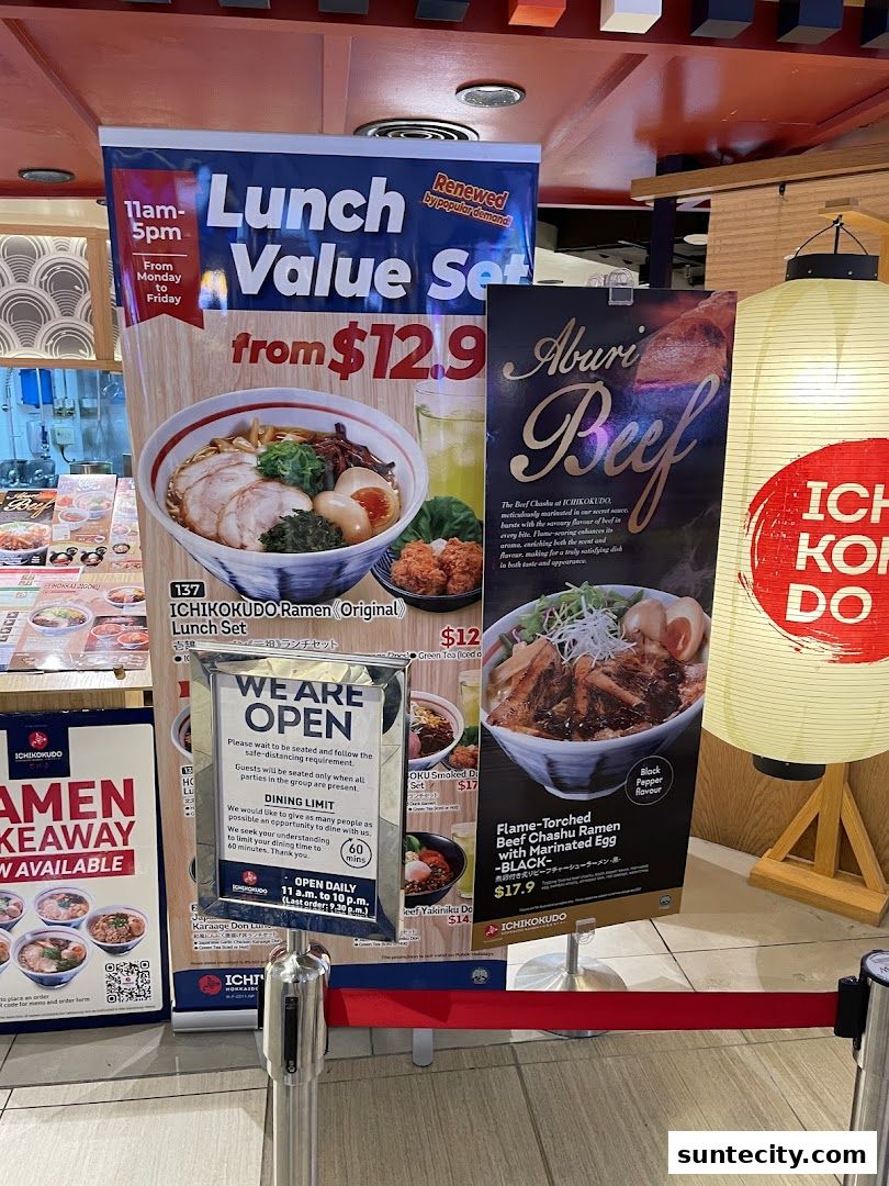 Promotional banners and signage for Ichikokudo Hokkaido Ramen, showcasing lunch sets and signature dishes.