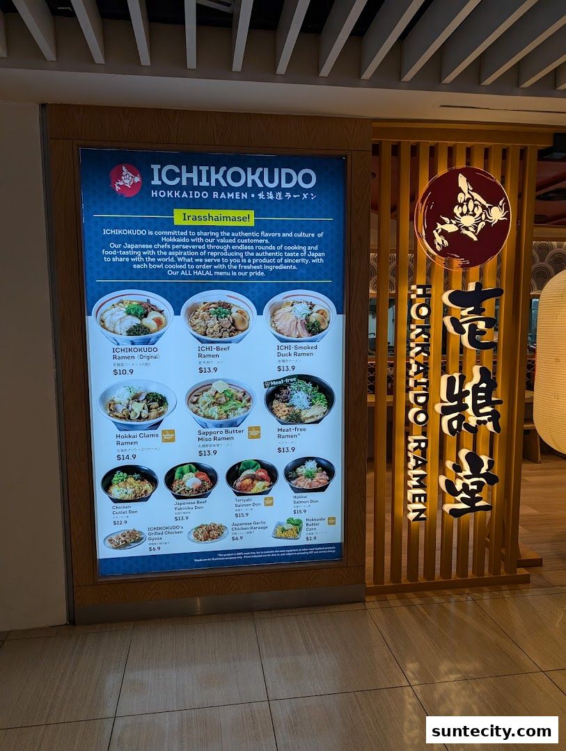 A menu display for Ichikokudo Hokkaido Ramen, showcasing various ramen dishes and donburi.
