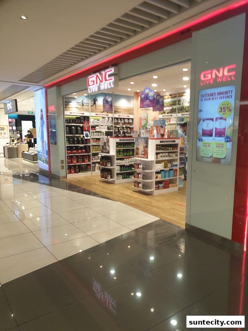 The GNC Live Well store entrance, showcasing health supplements and a 35% off promotion.