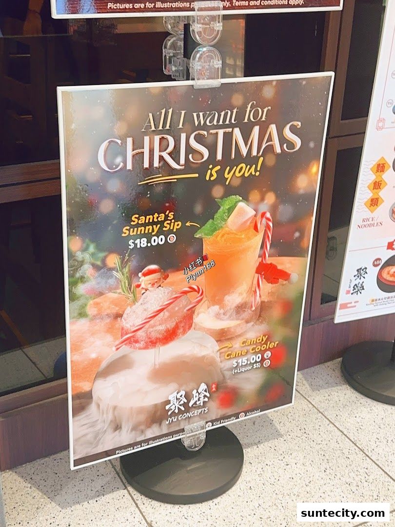 A festive Christmas-themed promotional sign for Jyu Lae Bistro featuring two holiday drinks.