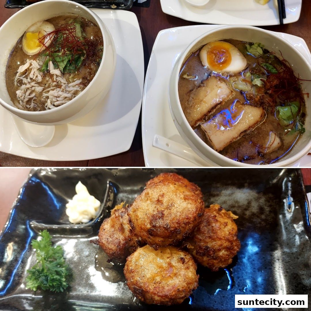 Two bowls of ramen and a plate of fried appetizers with dipping sauce.