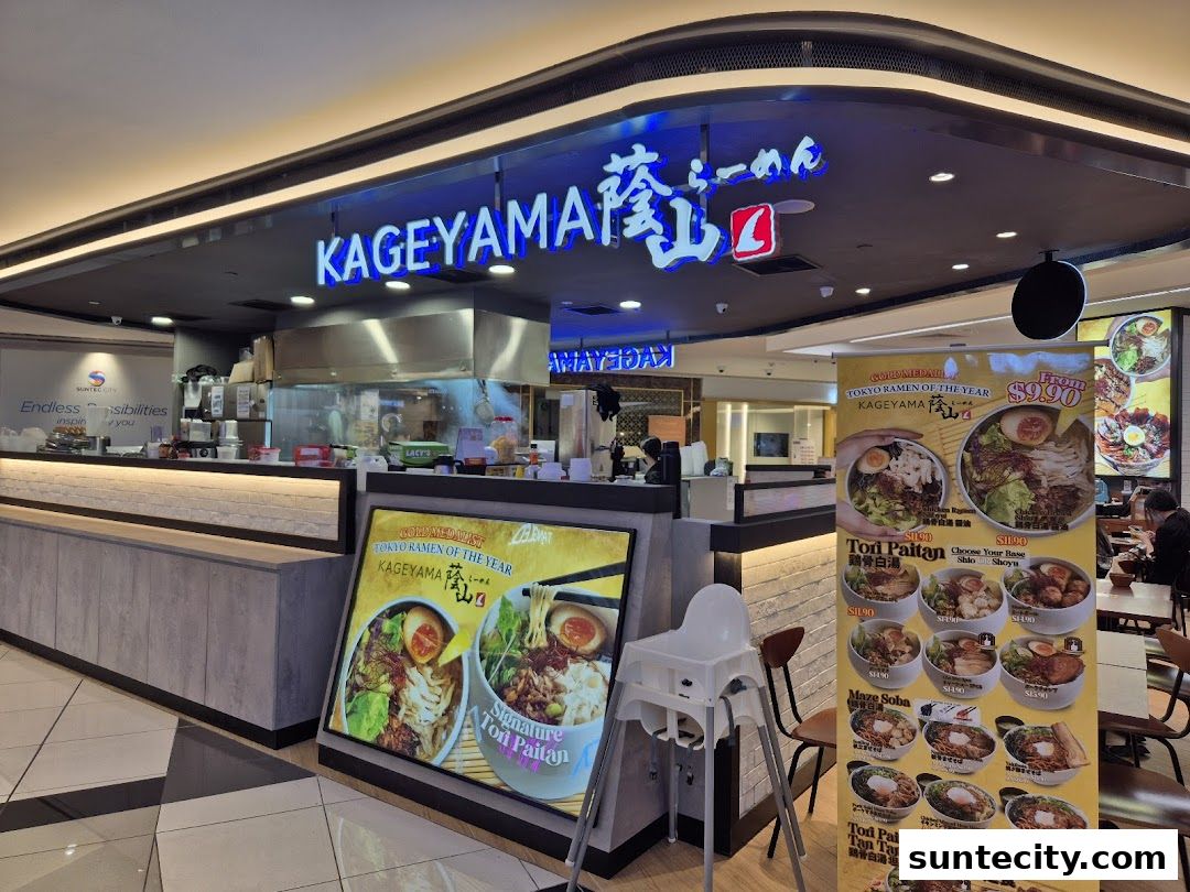 The exterior of Kageyama ramen shop with a menu display and seating area.