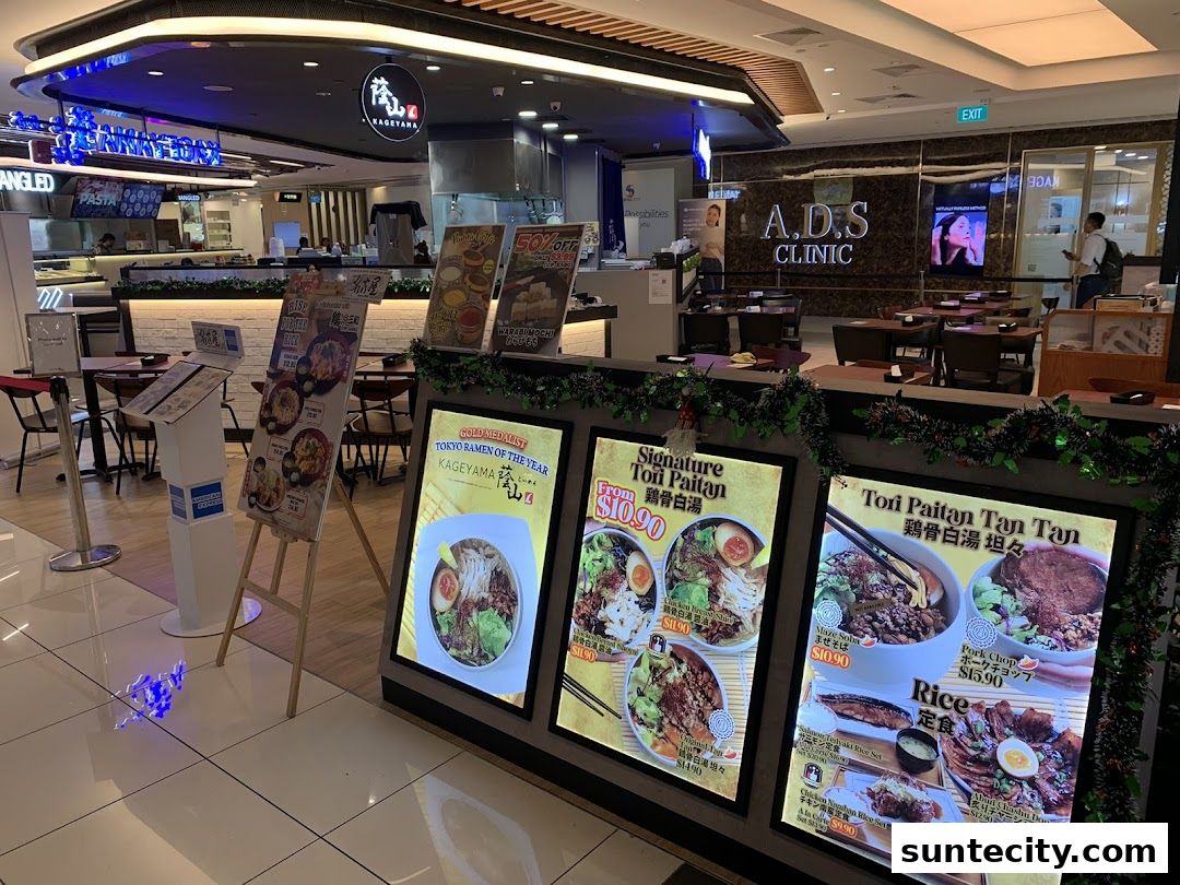 Kageyama Suntec City shop front with illuminated menu displays showcasing ramen and rice dishes.
