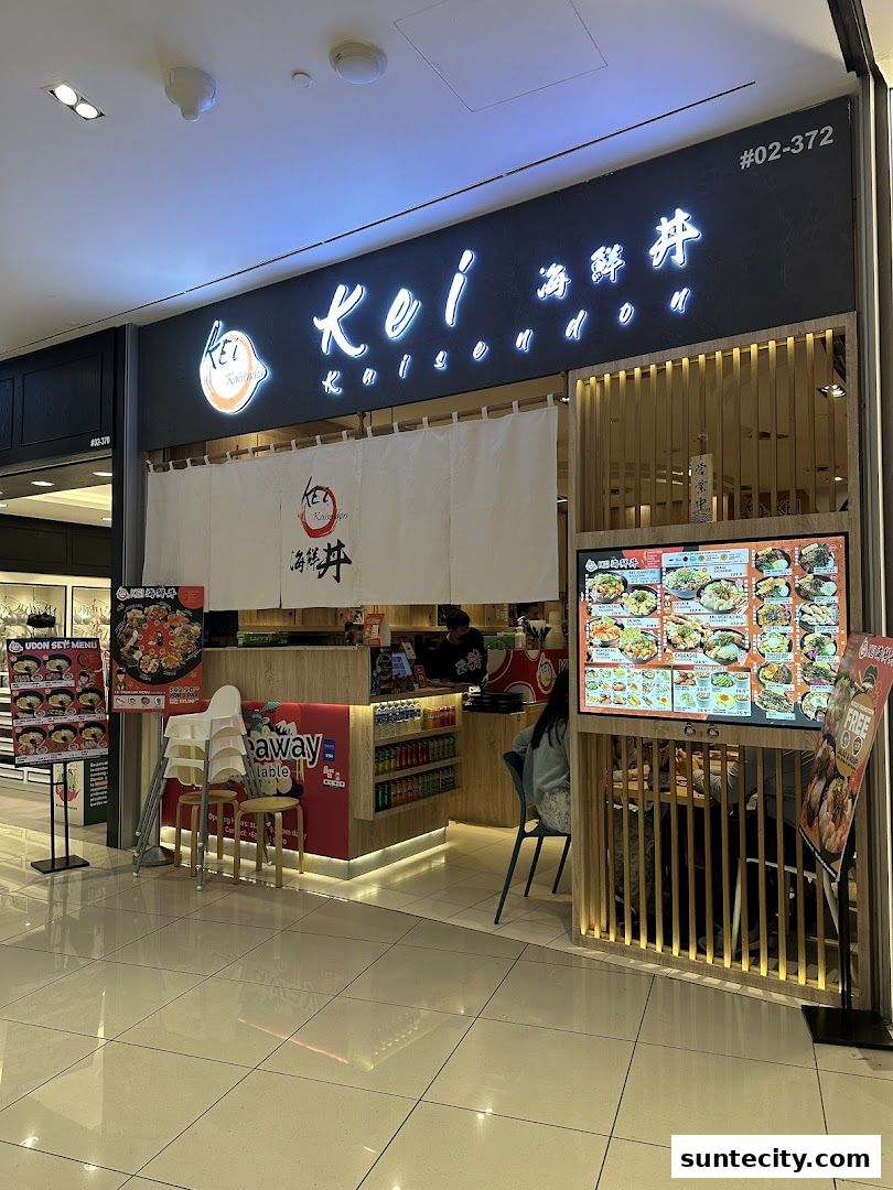 The exterior of Kei Kaisendon Suntec City, showcasing its menu and seating area.