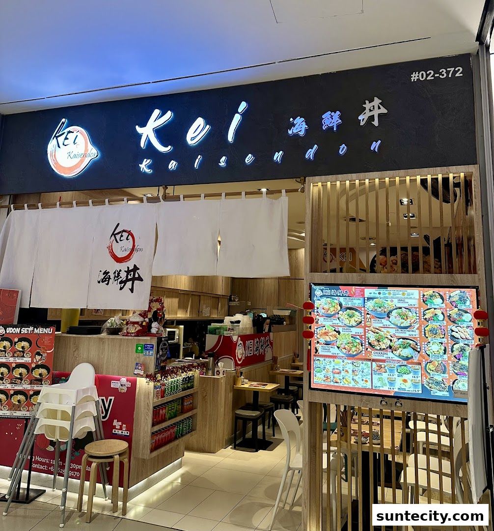 The exterior of Kei Kaisendon Suntec City, showcasing its signage and a digital menu.