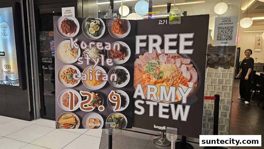 A shop front display featuring Korean style caifan and free army stew.