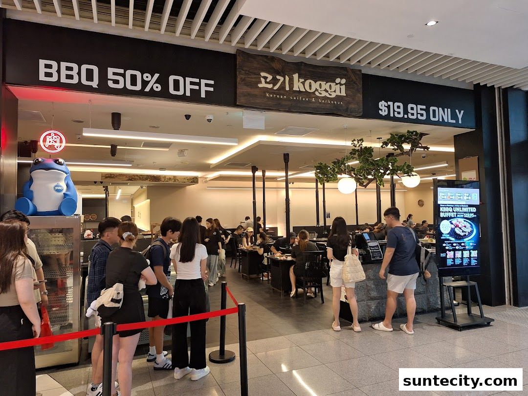Koggii Korean BBQ restaurant with a 50% off sign and an unlimited buffet offer.