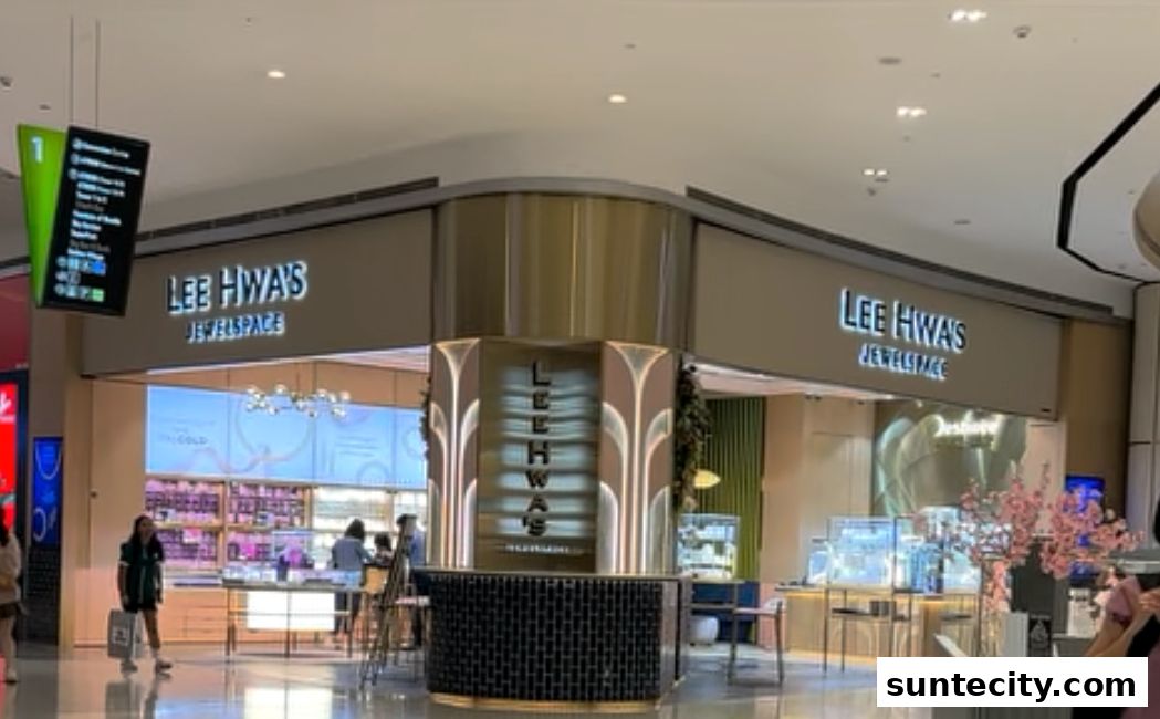 The Lee Hwa Jewellspace shop front with illuminated signage and display cases.