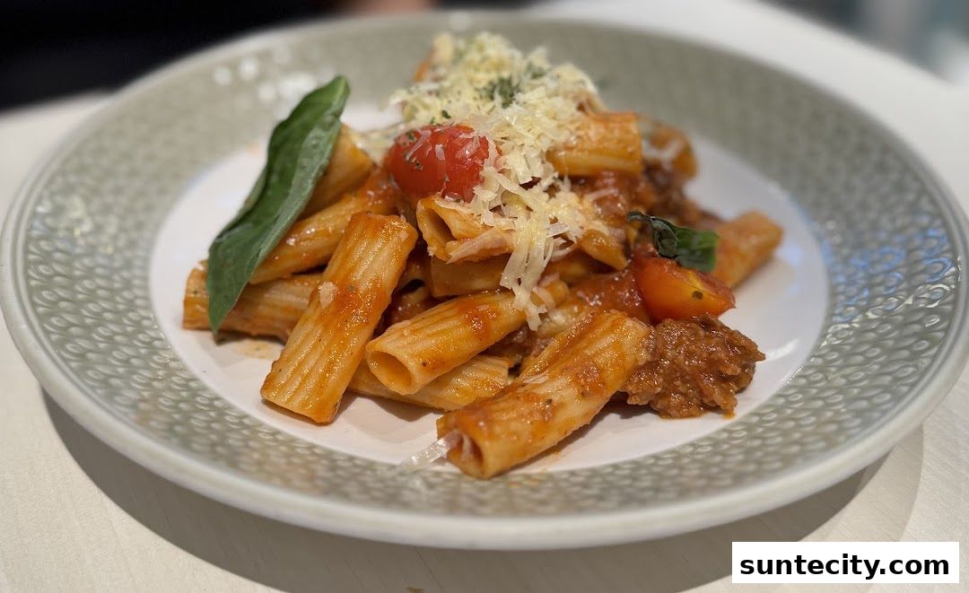 A close-up shot of a delicious pasta dish with tomato sauce and cheese.
