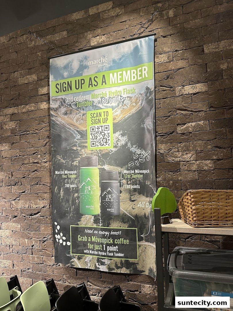 A promotional banner for Marché Movenpick offering membership sign-up and coffee rewards.