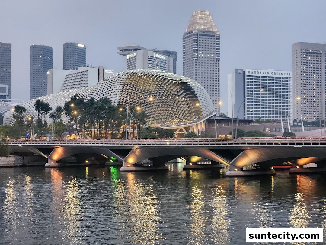 A scenic view of the Singapore skyline with the Esplanade and Marina Bay Sands.