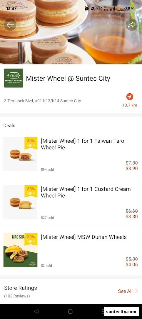 Mister Wheel @ Suntec City showcasing deals on Taiwan Taro, Custard Cream, and Durian Wheel Pies.