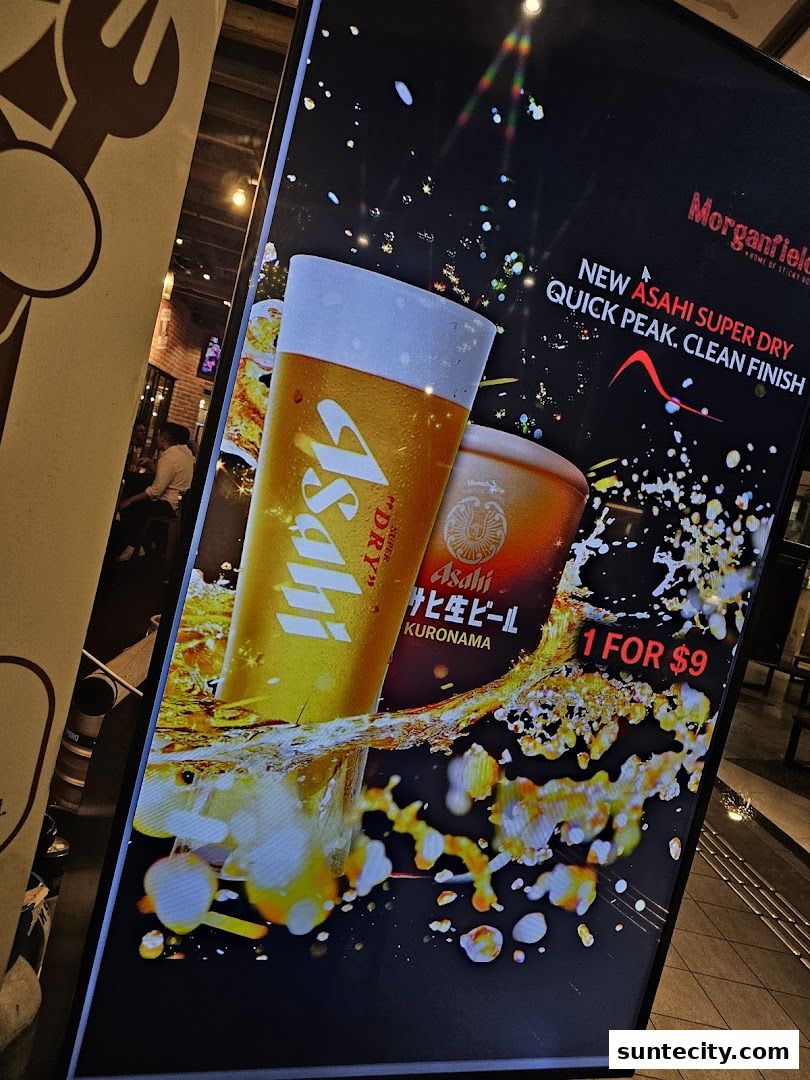 A digital advertisement for Morganfield's featuring Asahi Super Dry beer.